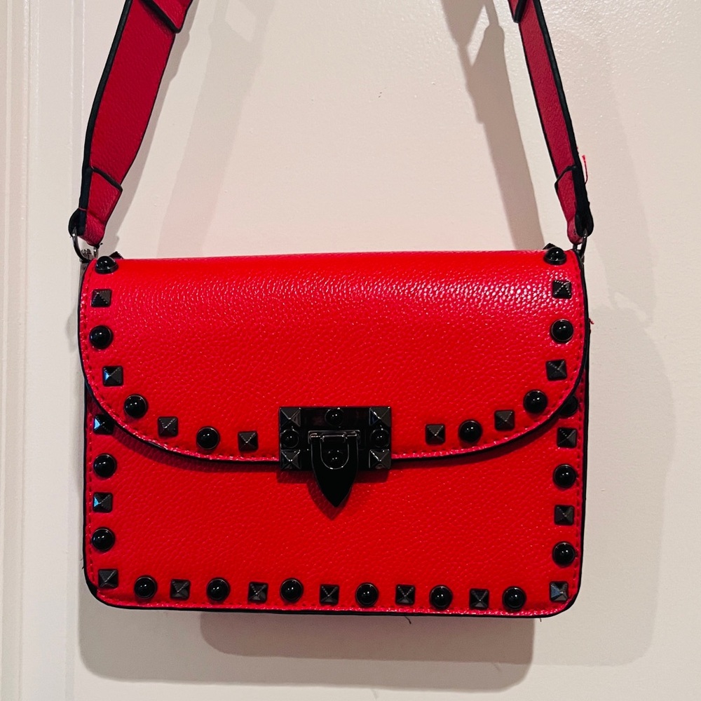 Red and Black Studded Crossbody Bag with Flap Closure
